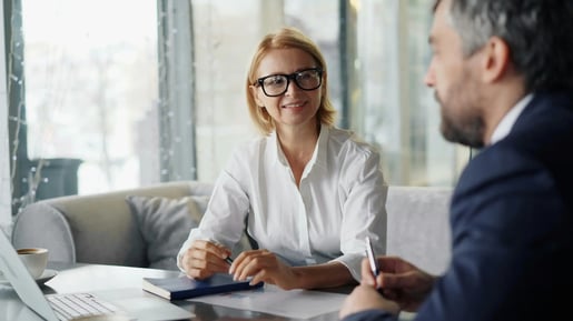 A manager offering constructive feedback to another team member